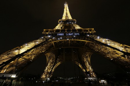Lights on the Eiffel Tower read, "Paris Climat 2015" to mark the selection of the French capital to host the United Nations Climate Change Conference in 2015